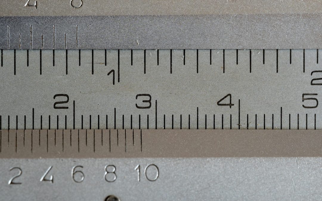 a close up of a measuring tape with numbers on it